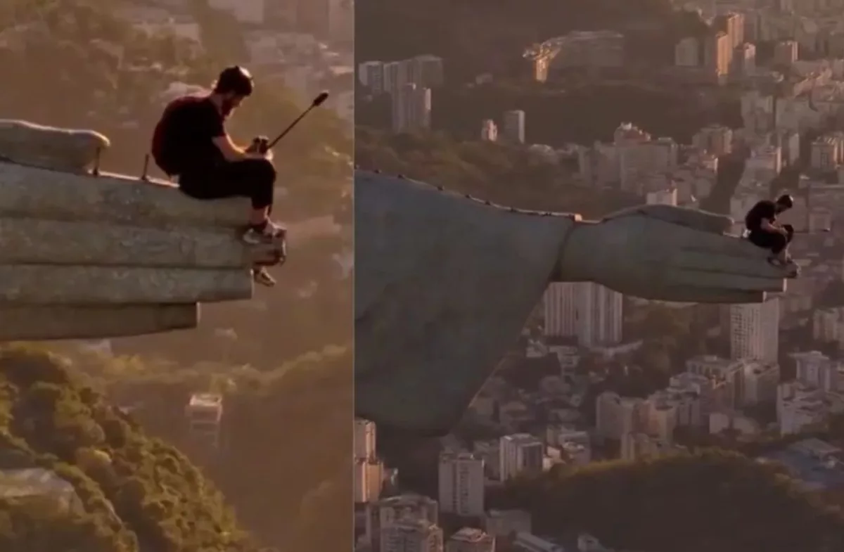 Homem salta da mão do Cristo Redentor, no Rio de Janeiro